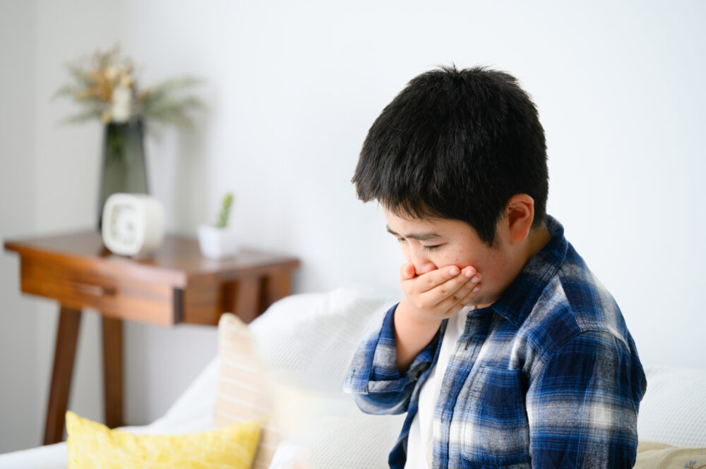 具合が悪そうな子供